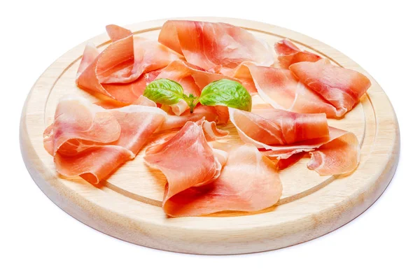 Placa de carne de jamón italiano o jamón español sobre tabla de cortar de madera —  Fotos de Stock