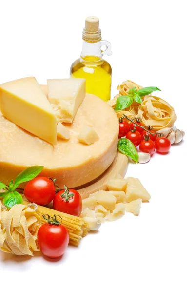 Traditional Italian parmesan or parmigiano cheese, pasta, tomatoes and olive oil Stock Image