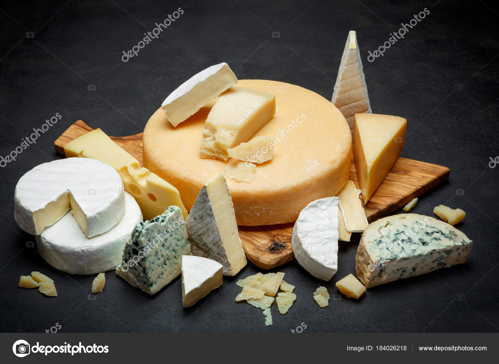 Various types of cheese parmesan, brie, roquefort, cheddar Stock