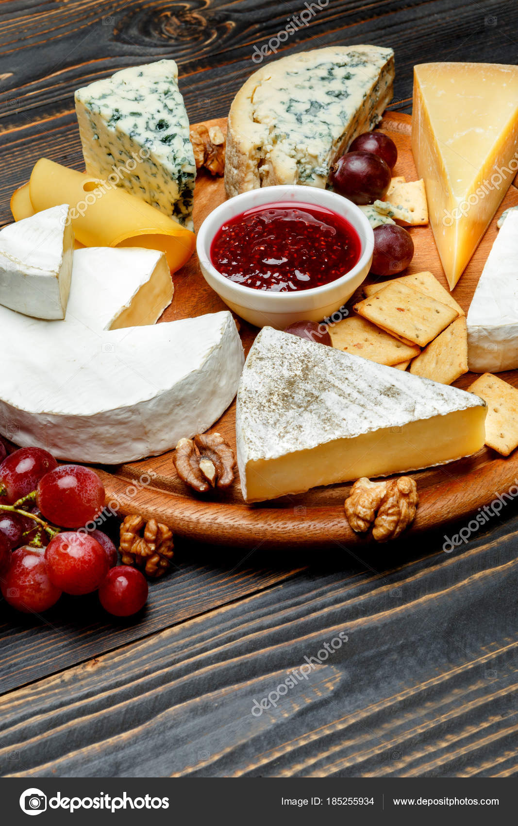 Various types of cheese parmesan, brie, roquefort, cheddar Stock