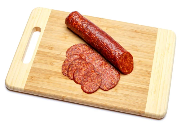 Italian Salami or spanish chorizo on wooden cutting board — Stock Photo, Image