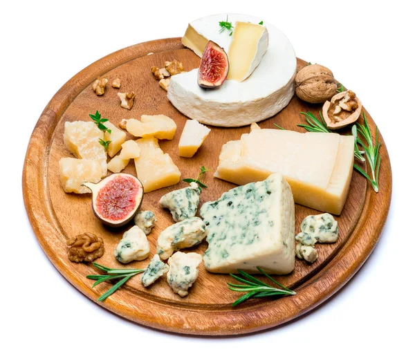 Various types of cheese - brie, camembert, roquefort and cheddar on wooden board — Stock Photo, Image