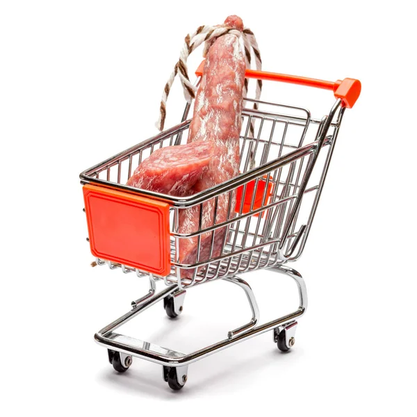 Salami smoked sausage in shopping cart on white background — Stock Photo, Image