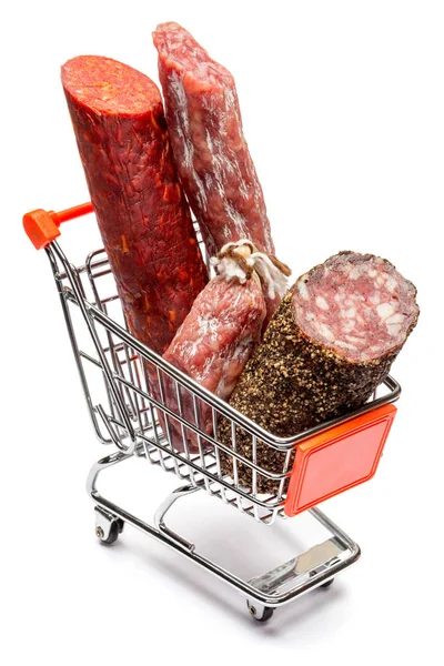 Salami smoked sausage in shopping cart on white background — Stock Photo, Image