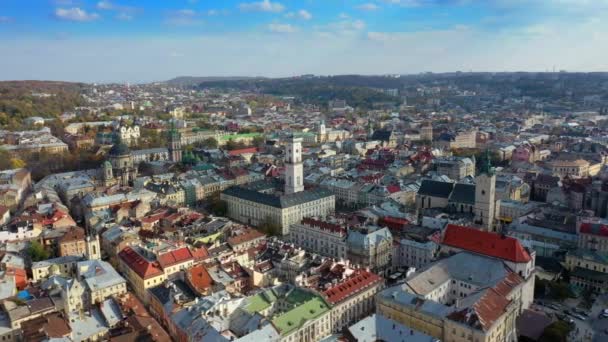 Aerial drone video of Lviv Old City center - roofs and streets, city hall Ratusha — Stock Video