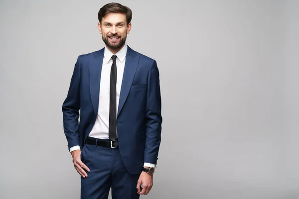 Studio photo of young handsome businessman wearing suit — Stock Photo, Image