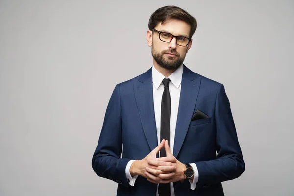 Studio photo of young handsome businessman wearing suit — Stock Photo, Image