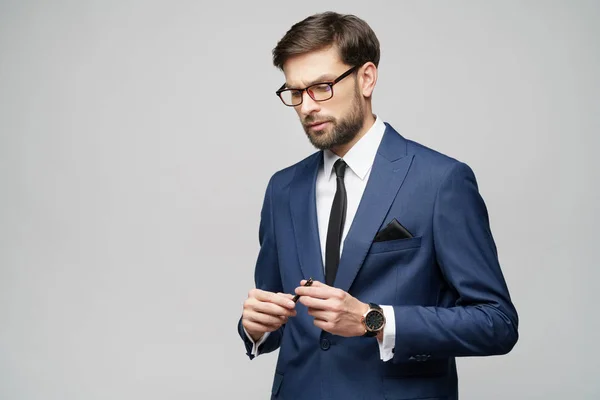 Studuo shot of thinking solving problem businessman wearing suit holding pen — Stock Photo, Image