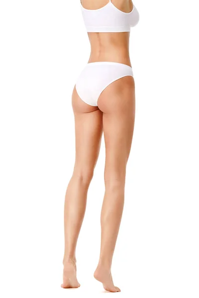 Slim gambe delle donne isolate su sfondo bianco — Foto Stock