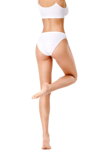 Slim ženy nohy izolované na bílém pozadí — Stock fotografie