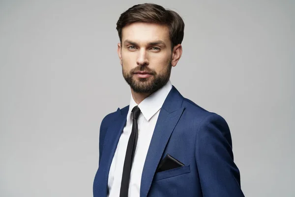 Studio photo of young handsome stylish businessman wearing suit — Stock Photo, Image