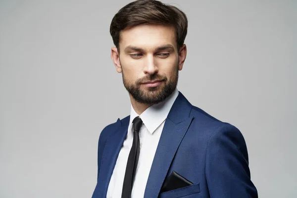 Studio photo of young handsome stylish businessman wearing suit — Stock Photo, Image