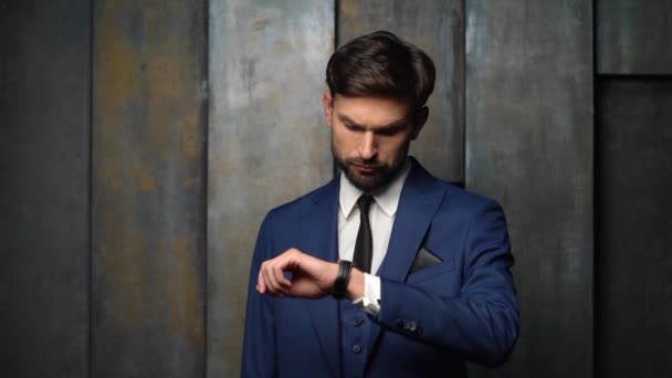 Full hd video of young handsome stylish businessman - 4x slow motion - looking at watch — Stock Video