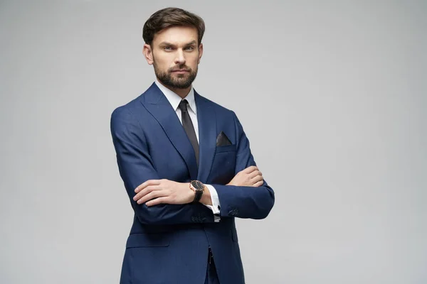 Studio photo of young handsome stylish businessman wearing suit — Stock Photo, Image