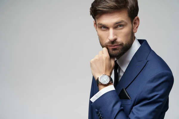 Studuo shot of thinking businessman wearing suit — Stock Photo, Image