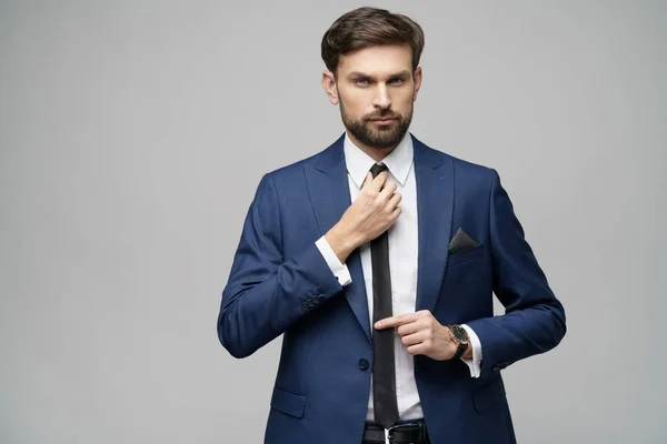 Studio photo of young handsome stylish businessman wearing suit — Stock Photo, Image