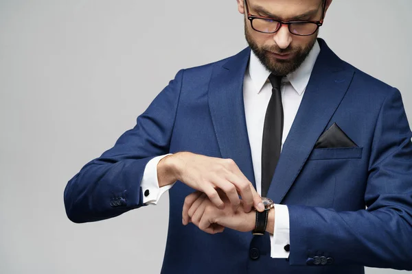 Studio shot stylish businessman wearing suit and watches — Stock Photo, Image