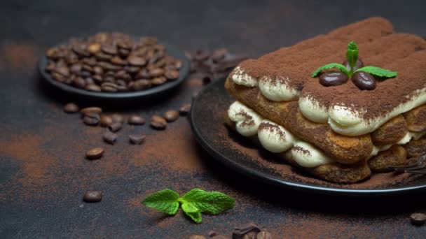 Classic tiramisu dessert on ceramic plate on concrete background — Stock Video