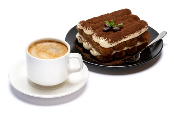 Classic tiramisu dessert on ceramic plate and cup of coffee isolated on white background with clipping path — Stock Photo, Image