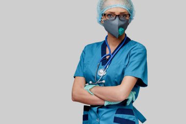 female doctor with stethoscope wearing protective mask and latex gloves over light grey background clipart