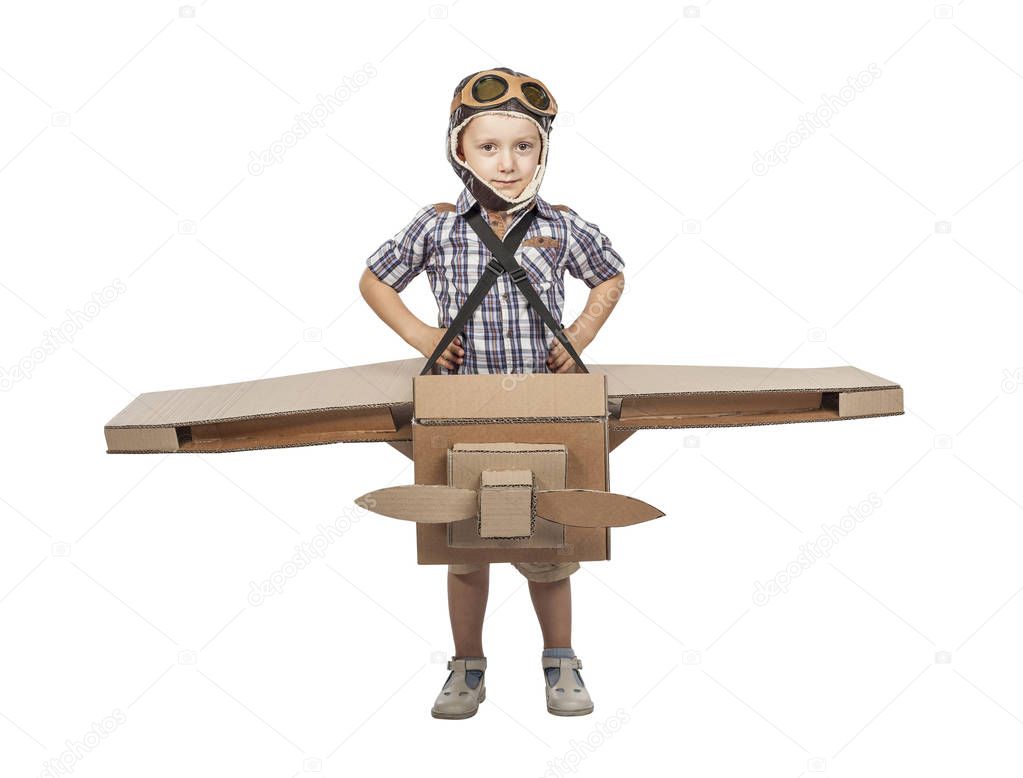 child with cardboard airplane