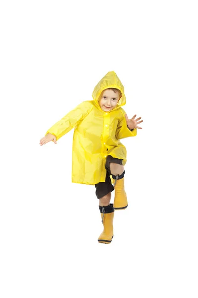 Criança com capa de chuva — Fotografia de Stock