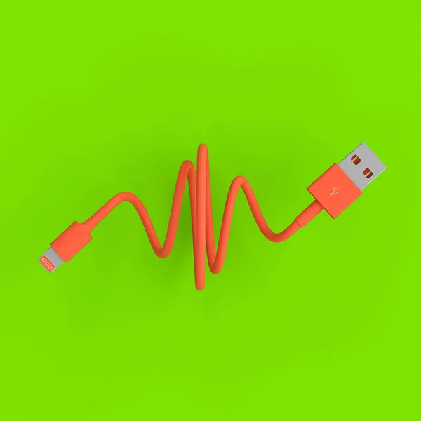 Coral-colored usb connection cable on a green background. — Stock Photo, Image