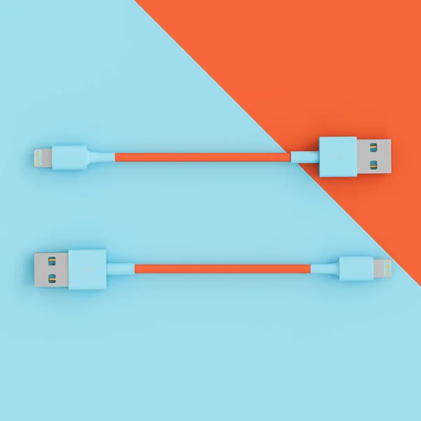 Blue and coral usb cables on a flat lay two-color background. — Stock Photo, Image
