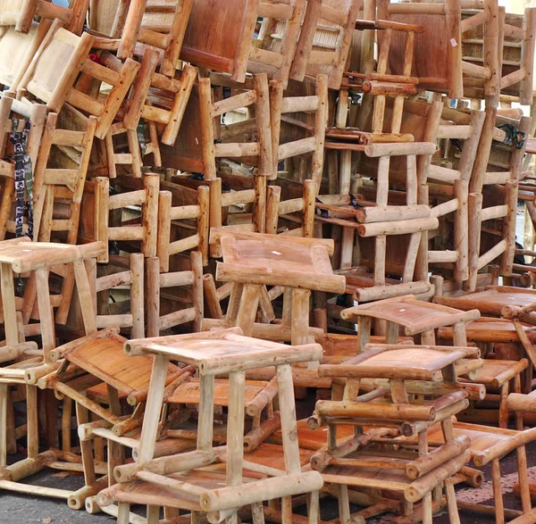 Street Vendor Sells Bamboo Stools Stock Photo