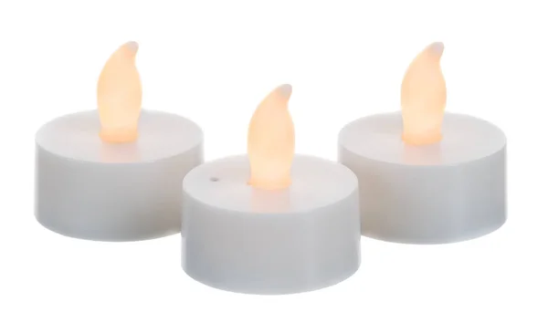 Three artificial candles burns — Stock Photo, Image