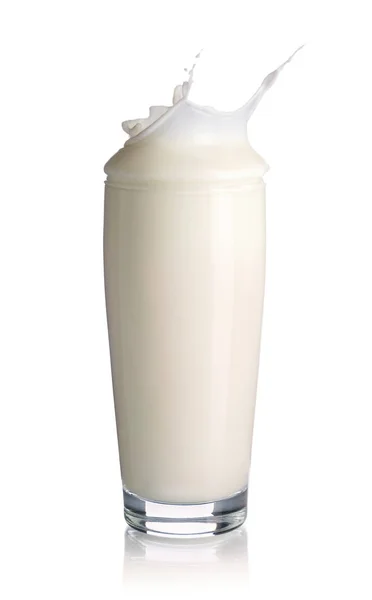 Splash of milk in the glass. Closeup — Stock Photo, Image
