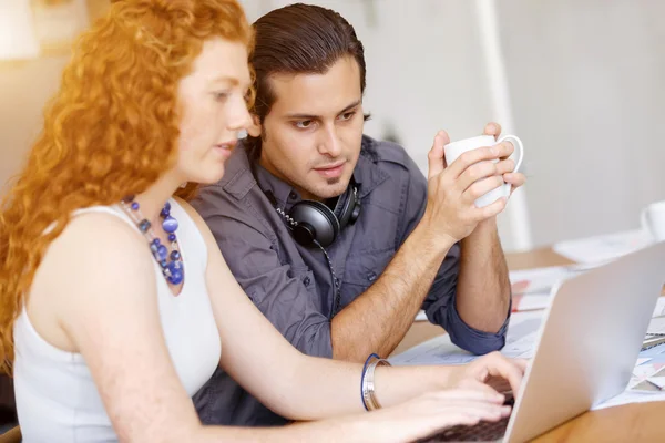 Two young people in office — Stock Photo, Image