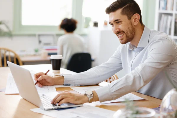 stock image Young man architect in office