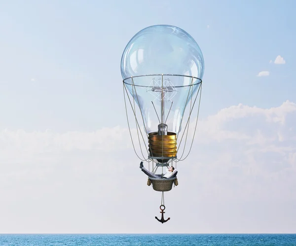 Mann im Aerostat unterwegs. Gemischte Medien — Stockfoto