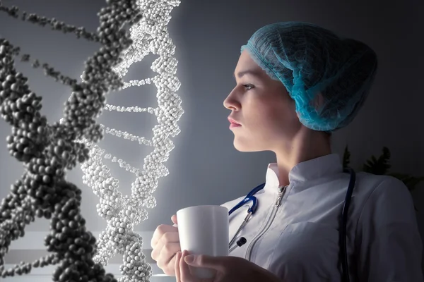 Scientist woman working in laboratory . Mixed media — Stock Photo, Image