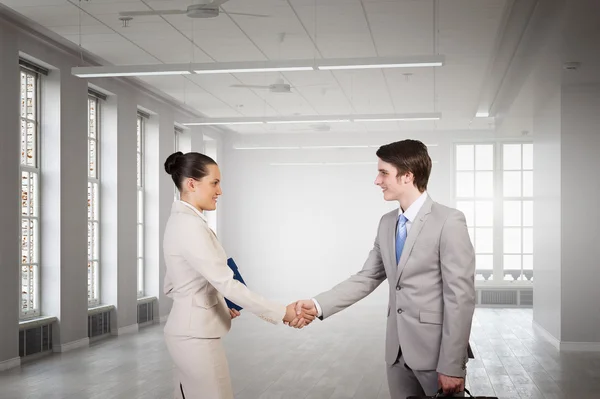 Business partners handshake . Mixed media — Stock Photo, Image