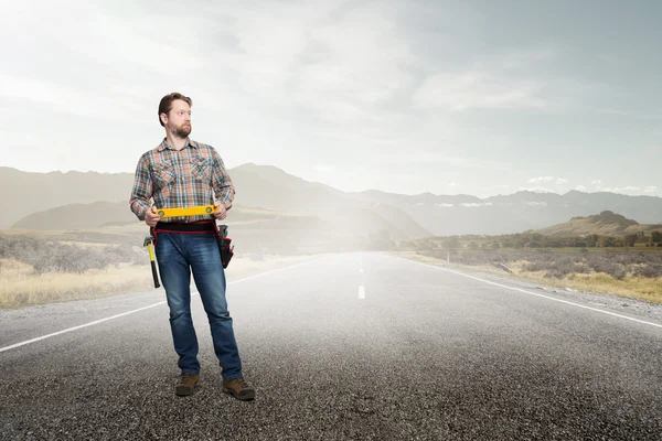 Adult engineer man . Mixed media — Stock Photo, Image