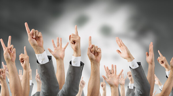 Group of people with raised hands . Mixed media