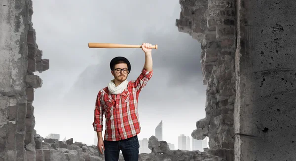 Hipster guy with bat . Mixed media — Stock Photo, Image