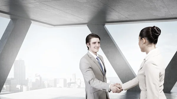 Obchodní partneři handshake. Kombinovaná technika — Stock fotografie