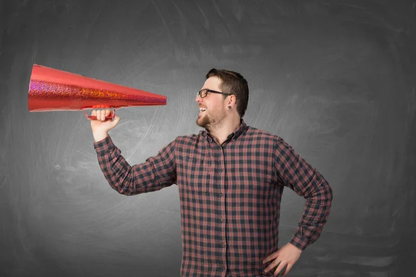 Hipster man shout in trumpet — Stock Photo, Image