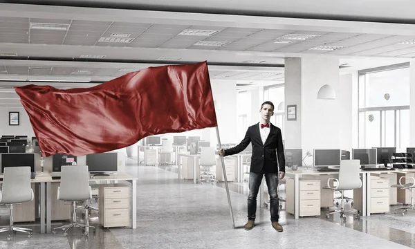 Man waving red flag . Mixed media — Stock Photo, Image