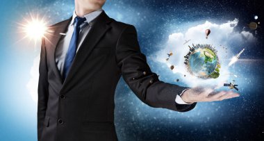 Tüm dünya onun ellerinde. Karışık ortam