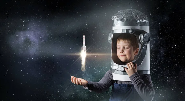 He want to become astronaut . Mixed media — Stock Photo, Image