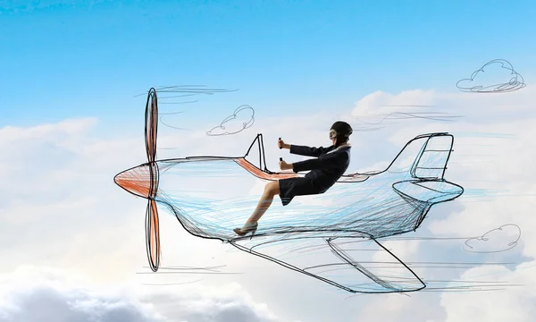 Woman pilot in drawn airplane . Mixed media — Stock Photo, Image
