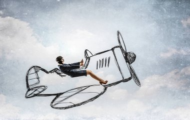 Çizilmiş uçak içinde kadın pilot. Karışık teknik