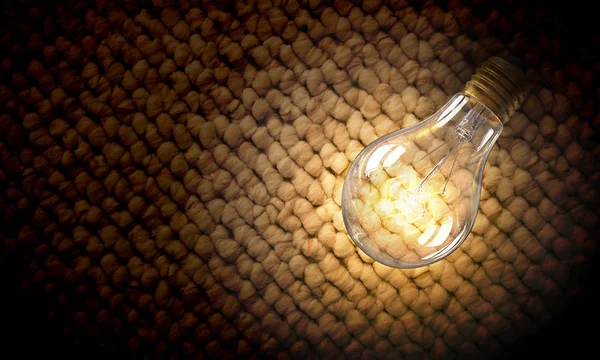 Elektrická žárovka na texturu. Kombinovaná technika — Stock fotografie