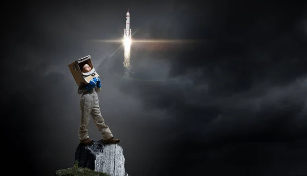 She wants to become astronaut . Mixed media — Stock Photo, Image