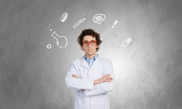 Young funny doctor . Mixed media — Stock Photo, Image