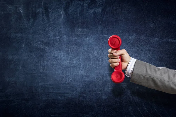 Telefoon ontvanger in de hand. Mixed media — Stockfoto